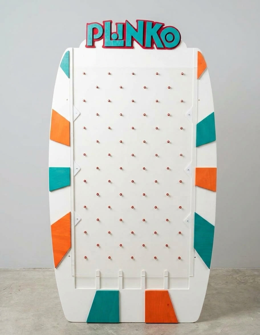 Giant white prize drop game board with a grid of pegs, teal and orange painted accents along the sides, and a dimensional wood sign on top