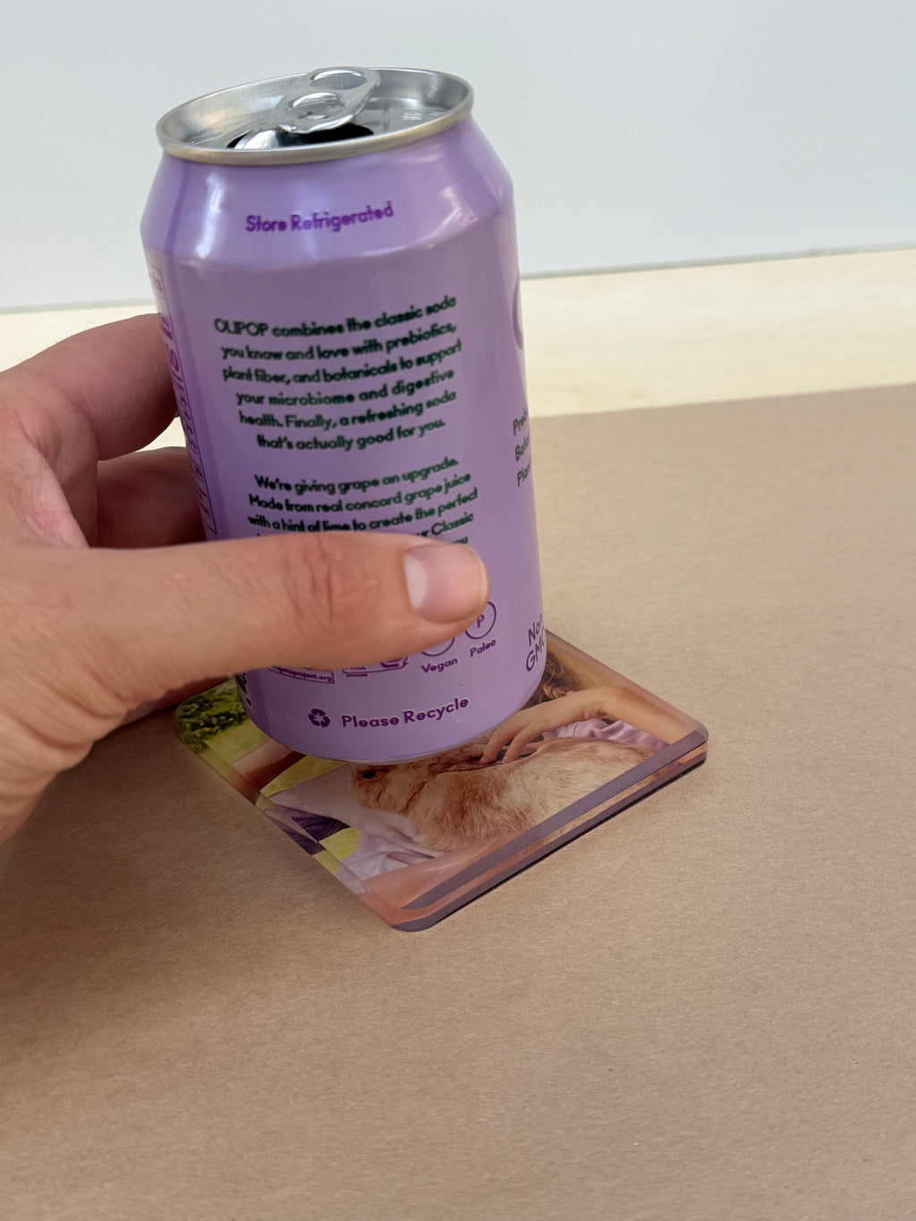 UV printed acrylic coaster in use under a drink