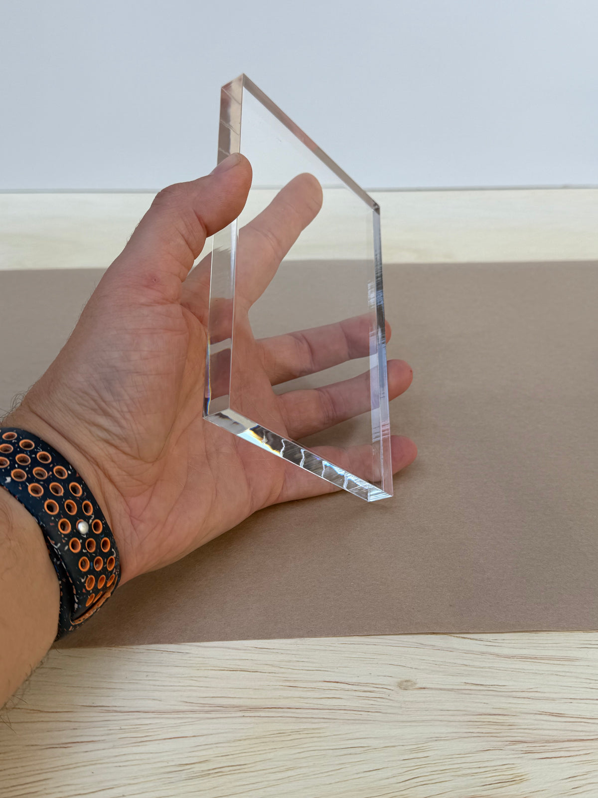 1/2 inch thick 4x6 clear acrylic piece held in hand