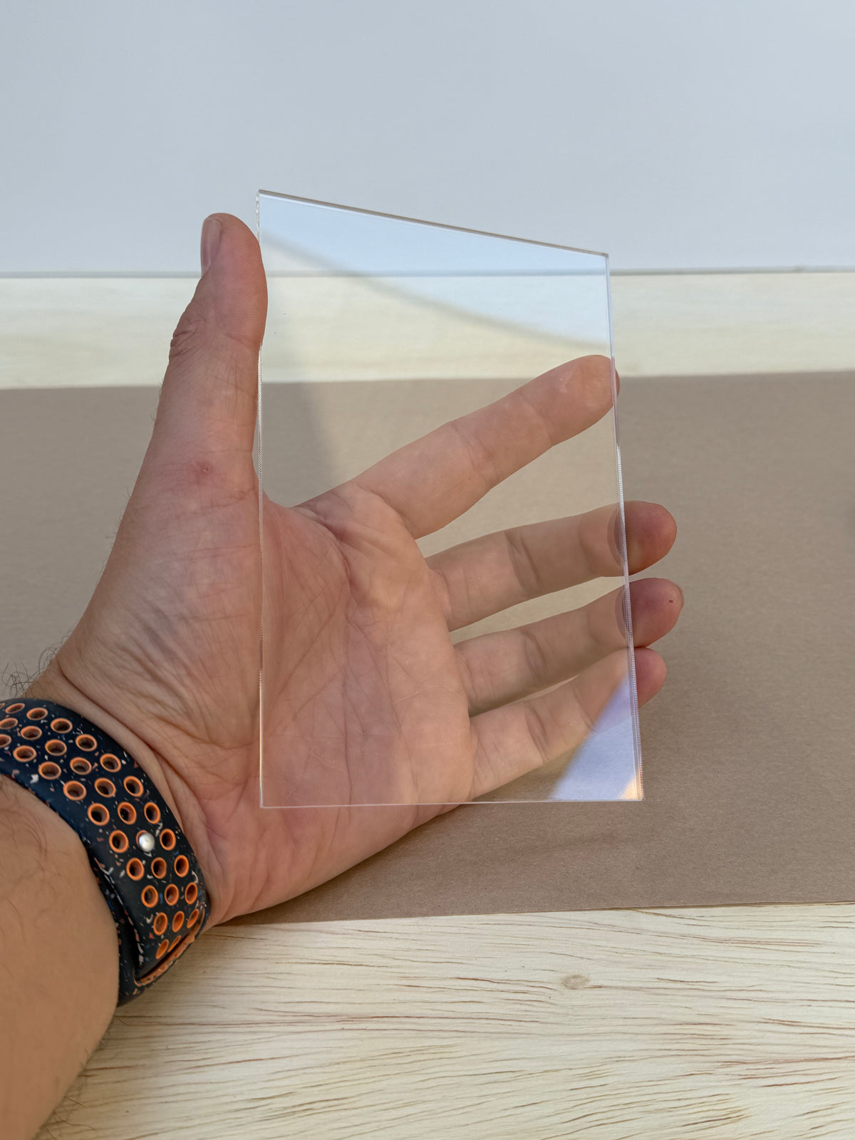 1/4 inch thick 4x6 clear acrylic piece held in hand