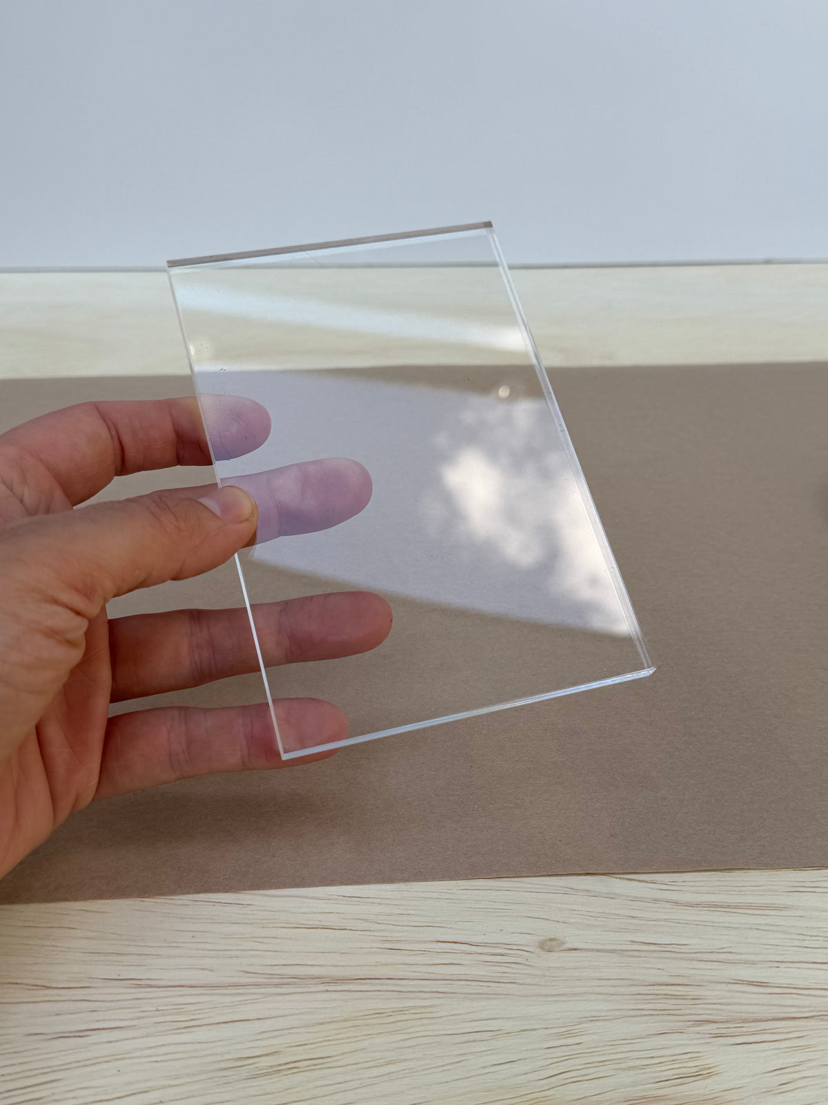 1/8 inch thick 4x6 clear acrylic piece held in hand
