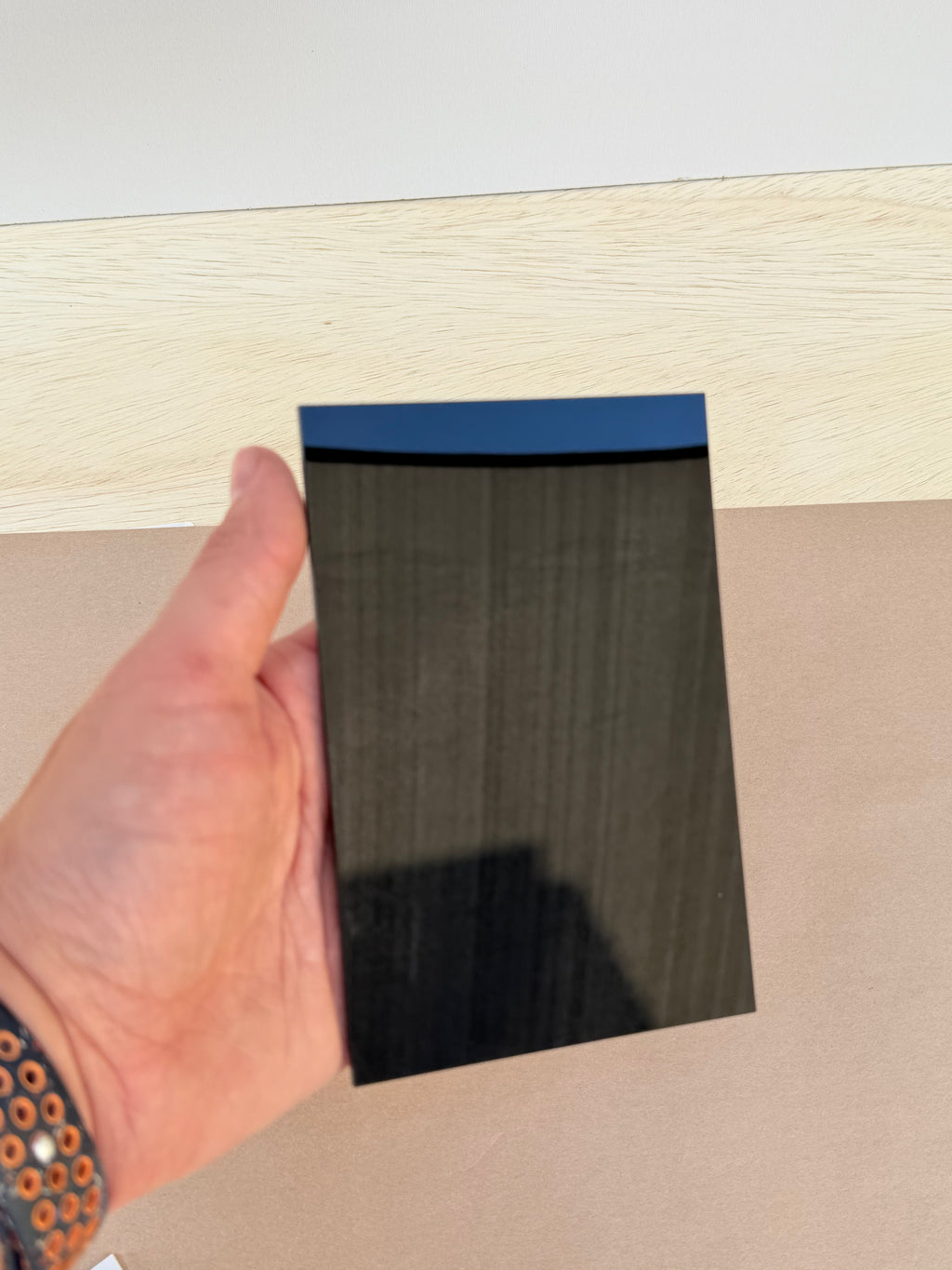 Black 4x6 inch acrylic photo blank held in hand