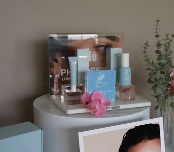 Acrylic Product Display Stand: Beauty Store Marketing Display with changeable photo holder back panel