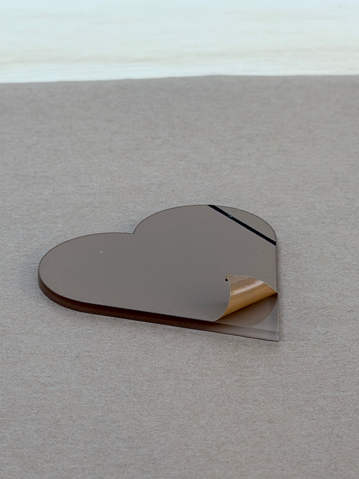 1/8 inch acrylic heart blank with protective film on both faces