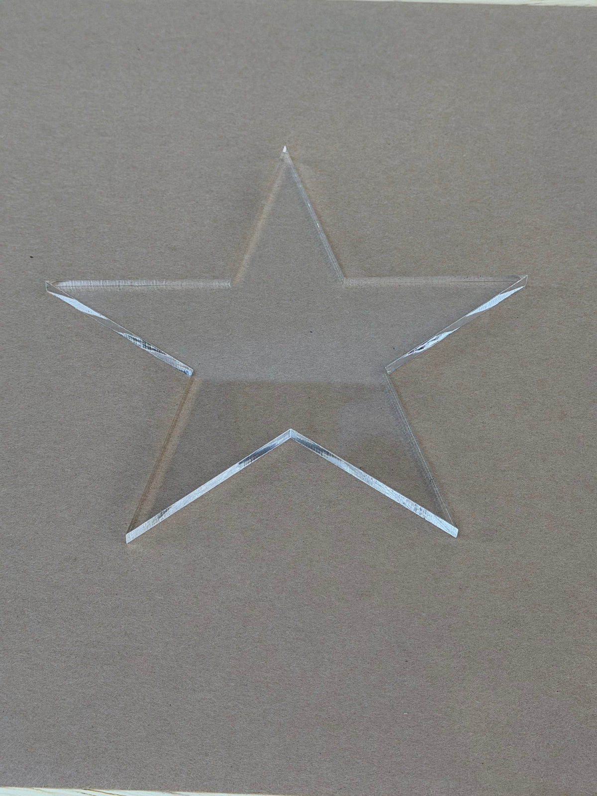 Polished laser cut edge on a 1/4 inch clear acrylic star blank
