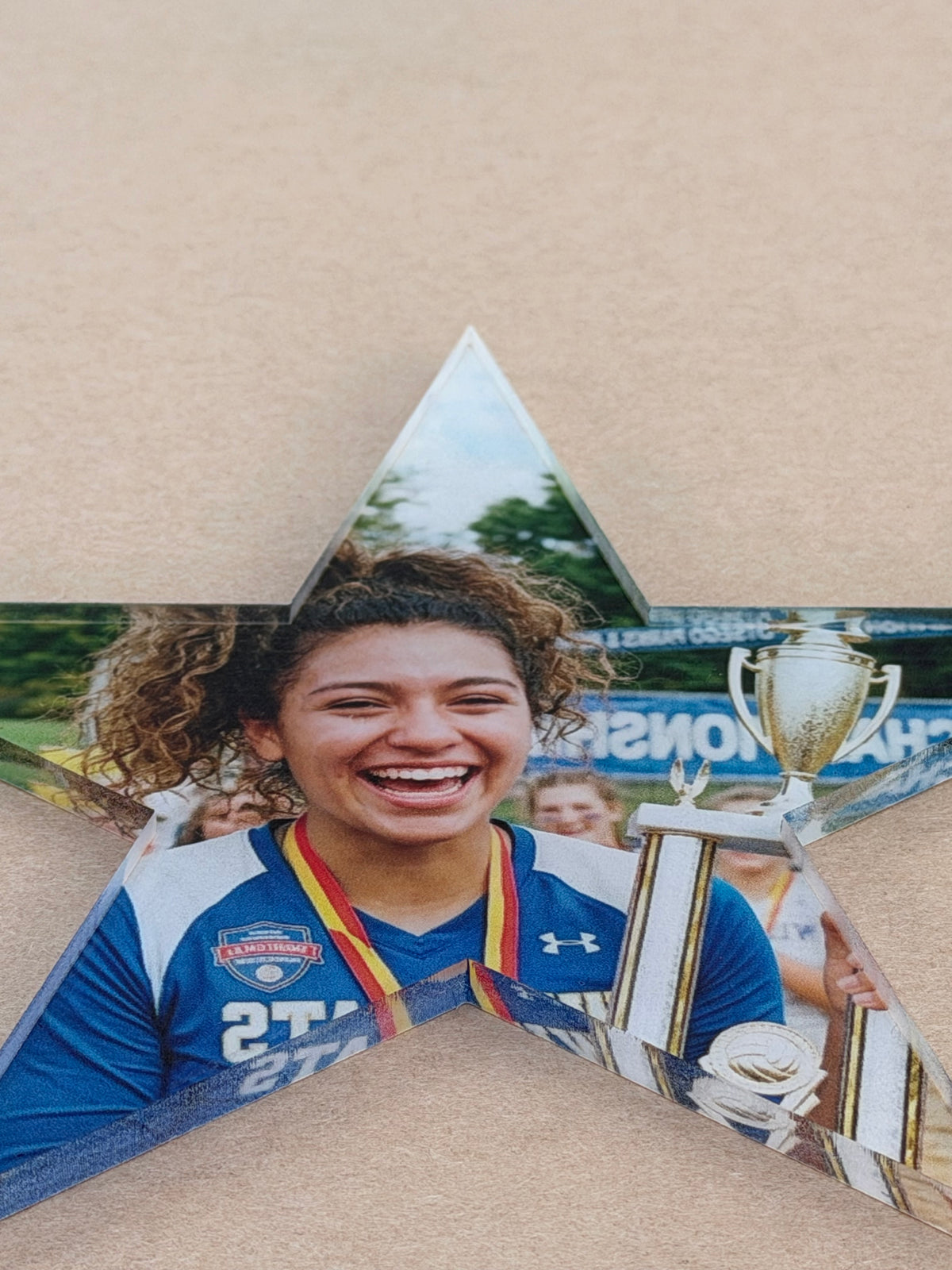 Close up of a UV printed photo on a 1/4 inch acrylic star