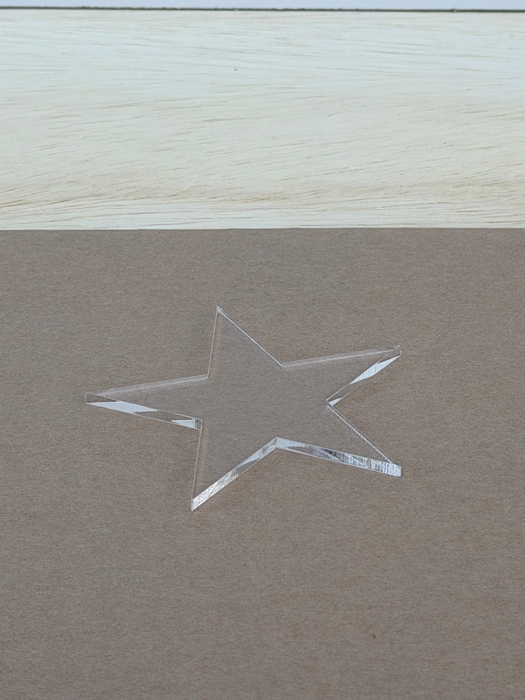 Polished laser cut edge on a 1/8 inch clear acrylic star blank