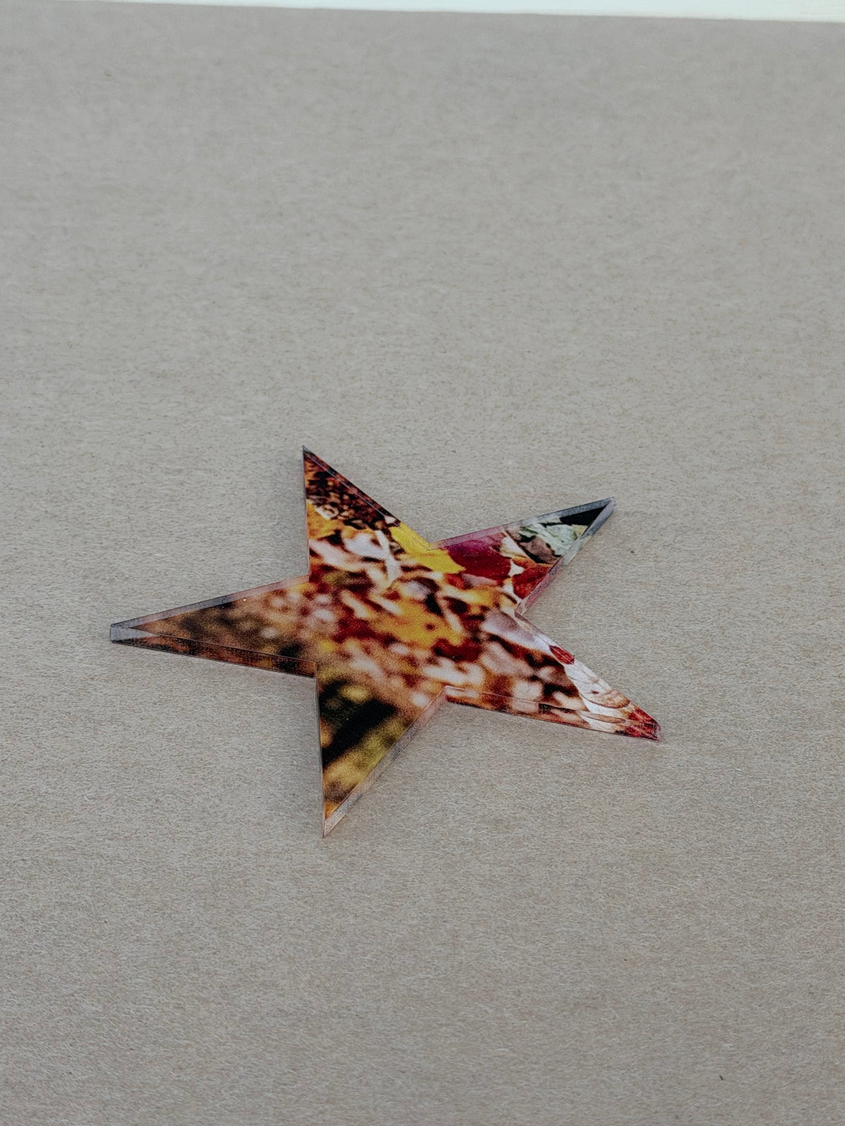 UV printed design on a 1/8 inch clear acrylic star blank