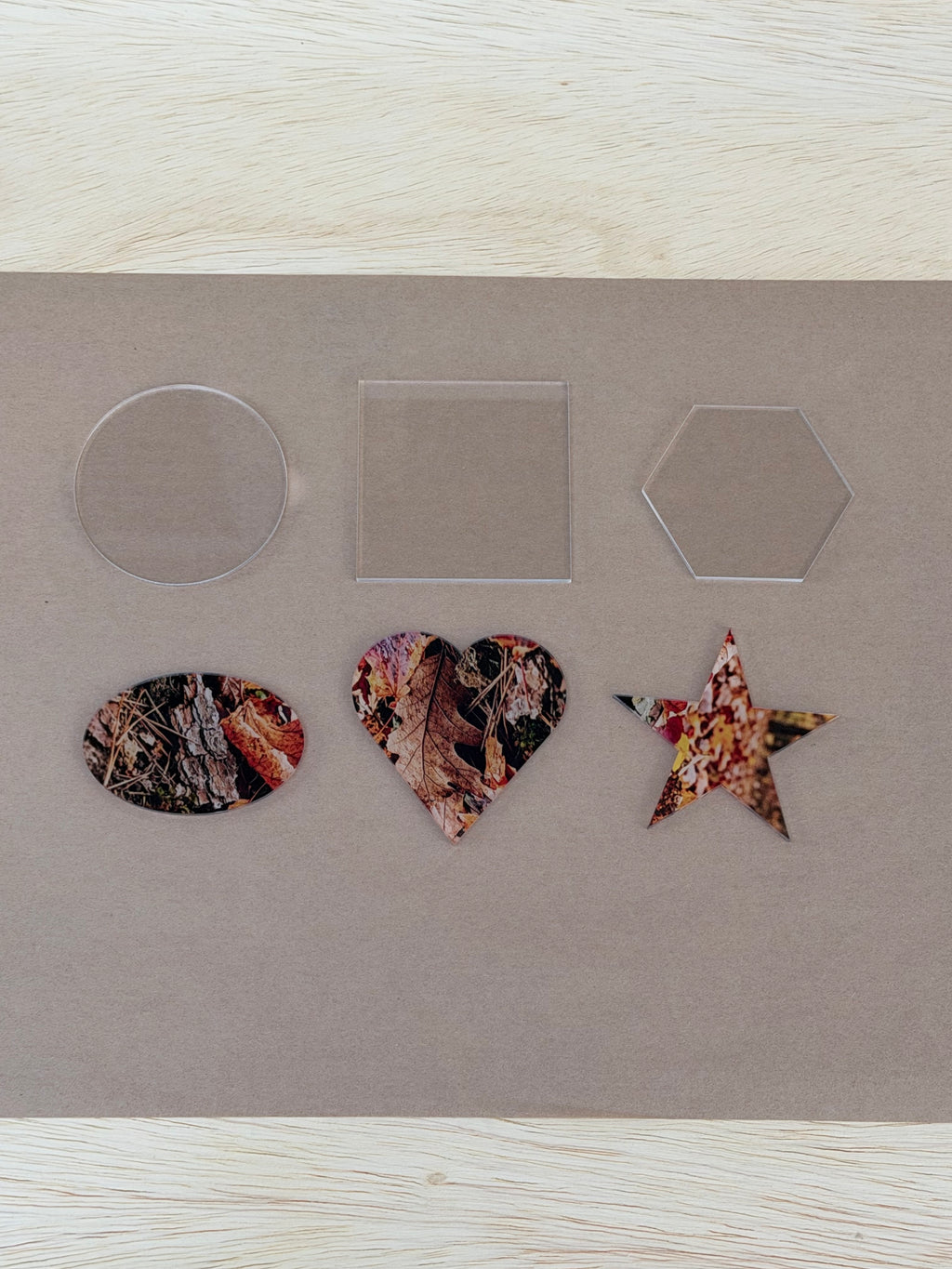 Six 3 inch acrylic blank shapes from the UV printer starter kit, clear and UV printed