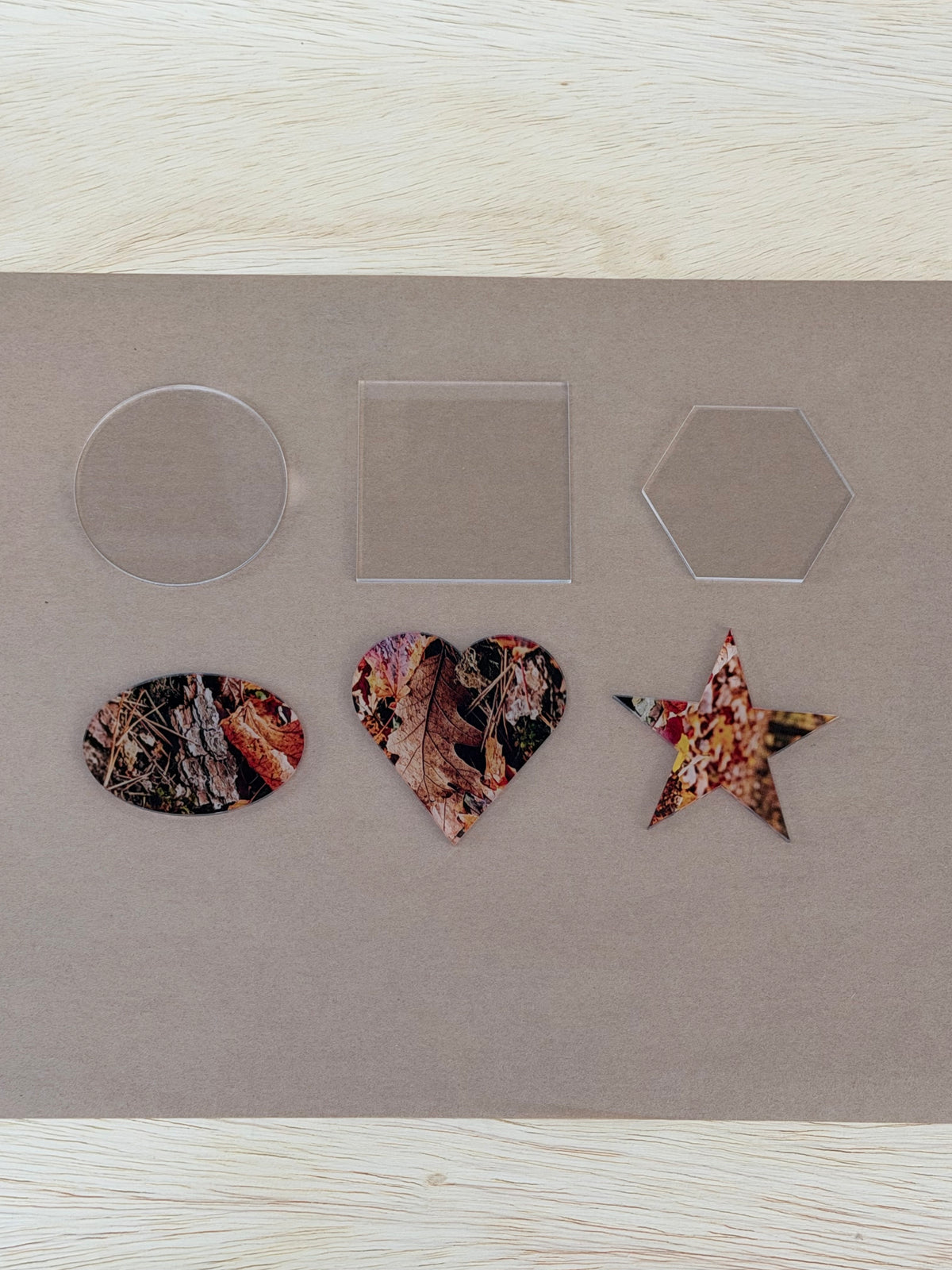 Six 3 inch acrylic blank shapes from the UV printer starter kit, clear and UV printed